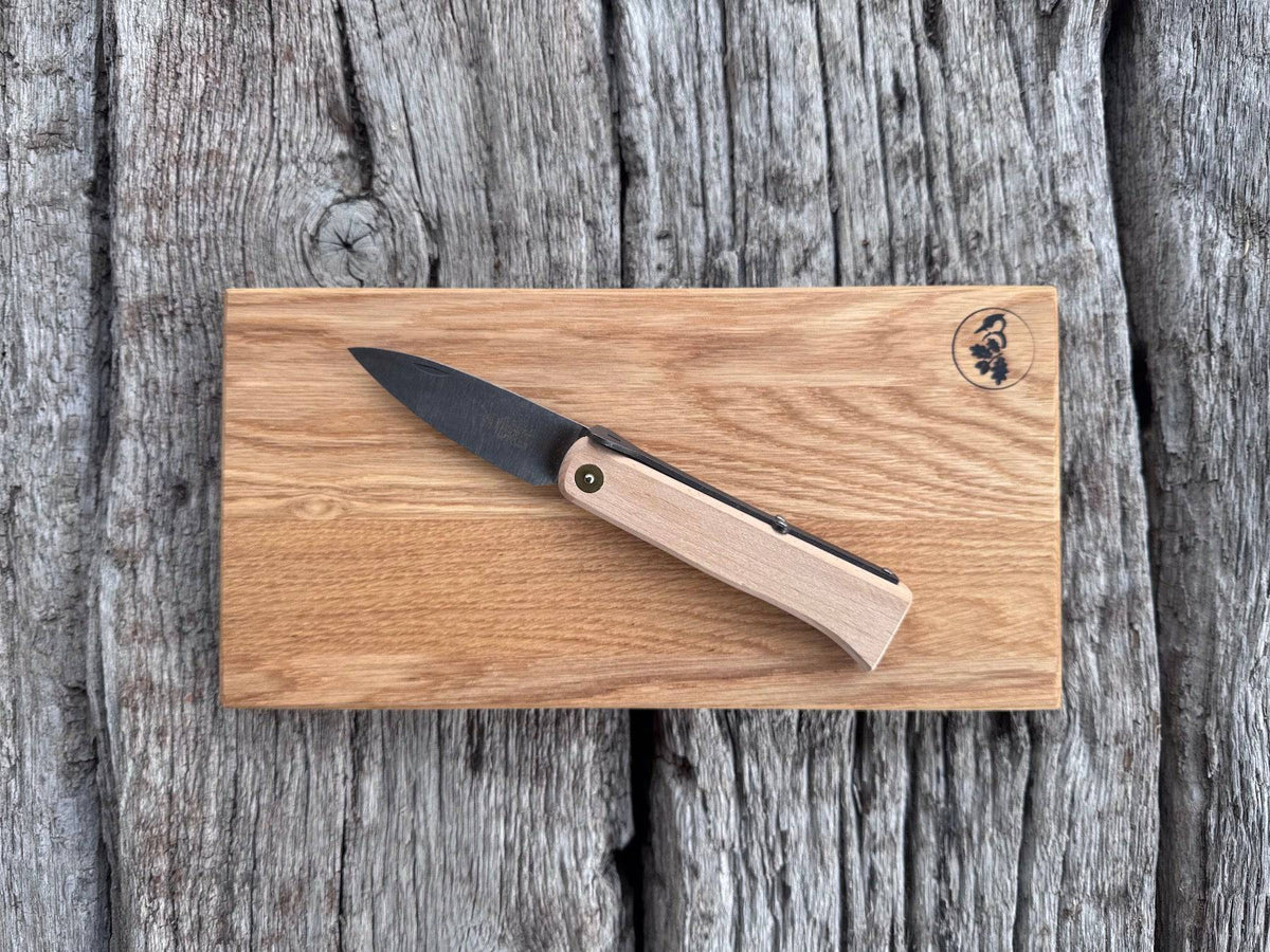 Brotzeitbrett mit einem Taschenmesser von Windmühlenmesser.
