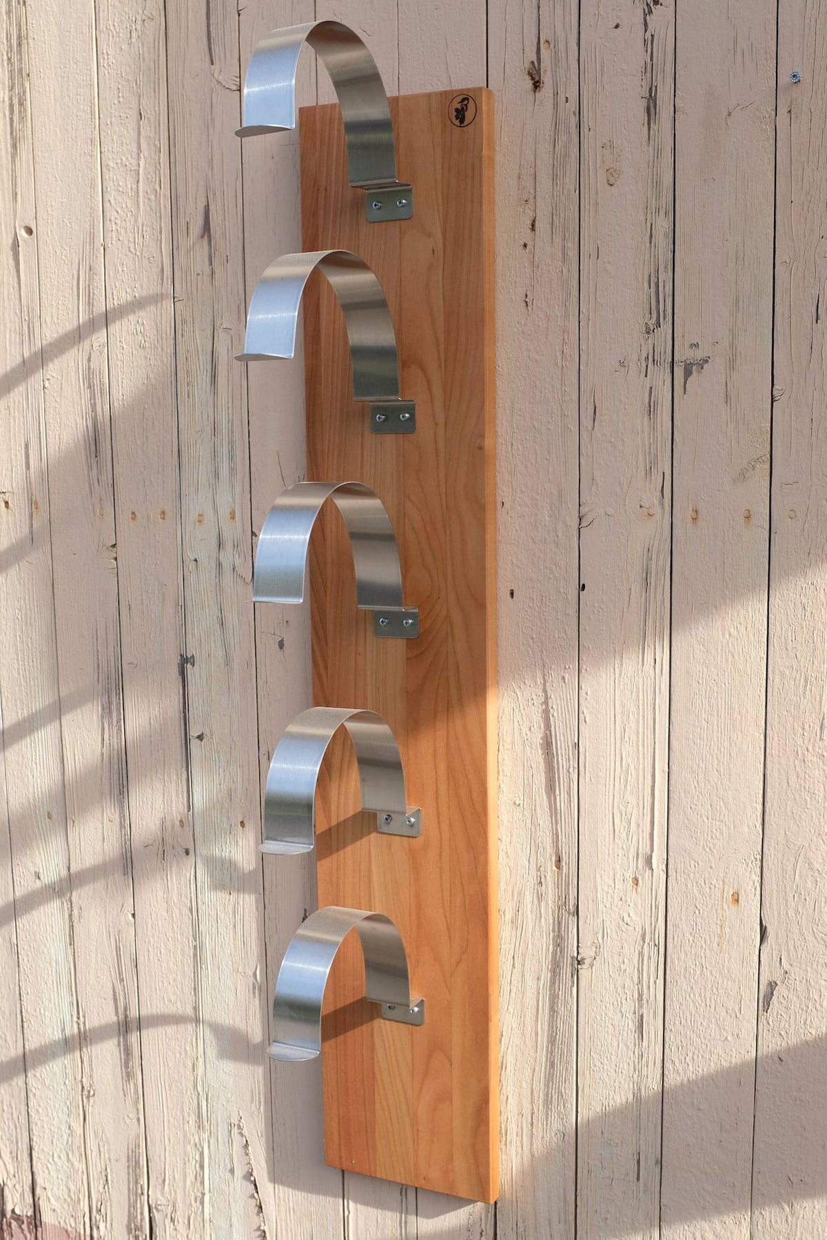 Kirschbaum Holz Caphalter mit Edelstahl Haltern.